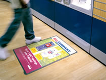 Windo� poster displays provides the complete in-store advertising solution to increase sales by communicating your message on unused floor and counter surfaces. This unique and inescapable medium stands out to increase brand awareness.